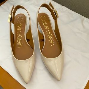 Calvin Klein Off White Patent Leather Pumps